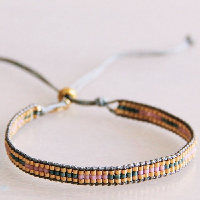 Vævet armbånd lilla/grøn/guld Bazou