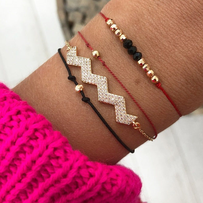 Armbånd tråd med kugler sort