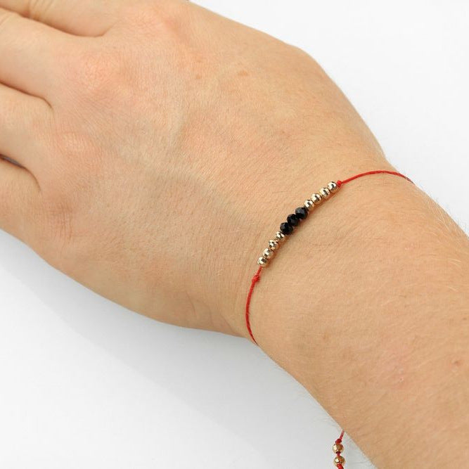 Armbånd tråd med kugler rød