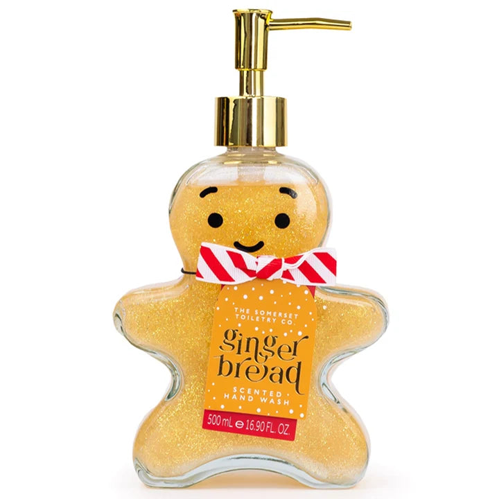 Julehåndsæbe Gingerbread 500 ml i gennemsigtig peberkagefyr-formet flaske med gyldent glimmer, guldpumpe og rødhvid sløjfe