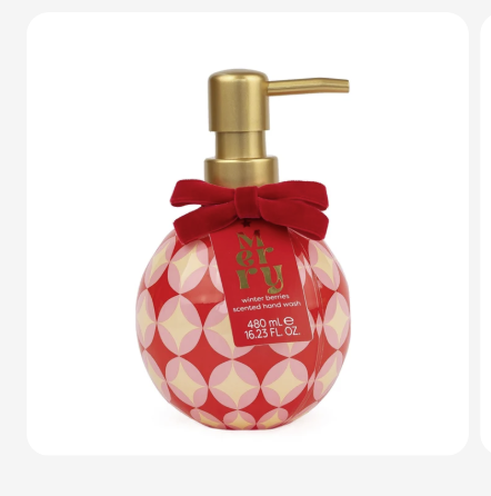 Julehåndsæbe Winter Berries 480 ml i kugleformet rød flaske med guldpumpe og rød sløjfe